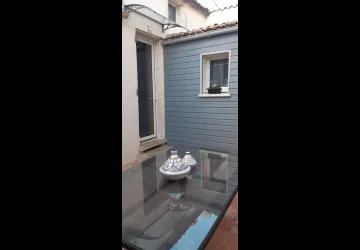 Maison roses trèmières